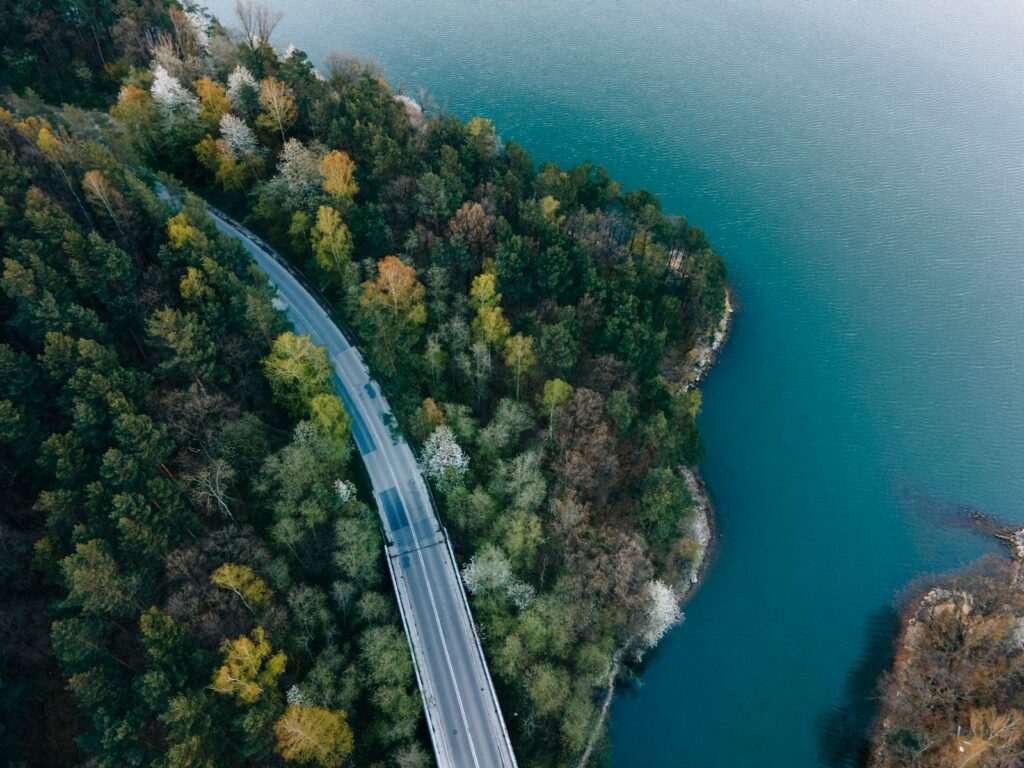 white bridge over blue sea during daytime